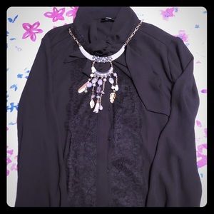 Black button up blouse.